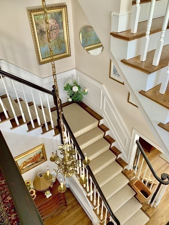 39 Vine Brook Road Medfield, MA 02052 - Photo 19 of 42 a view of an entryway and hall with wooden floor