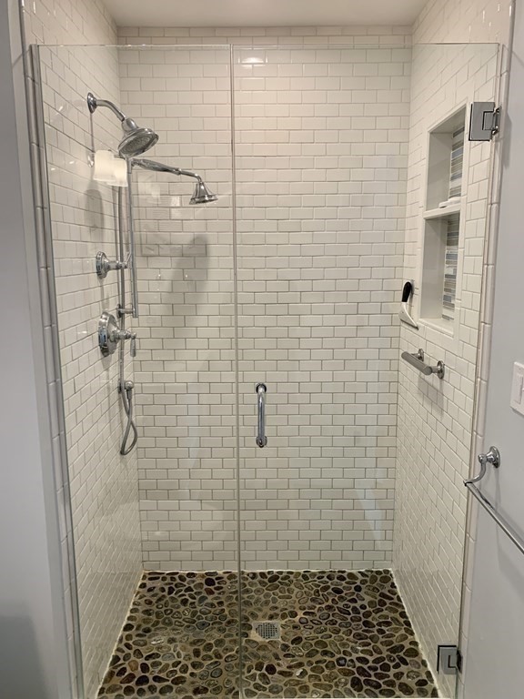 39 Vine Brook Road Medfield, MA 02052 - Photo 23 of 42 a bathroom with a shower