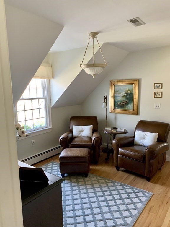 39 Vine Brook Road Medfield, MA 02052 - Photo 24 of 42 a living room with furniture