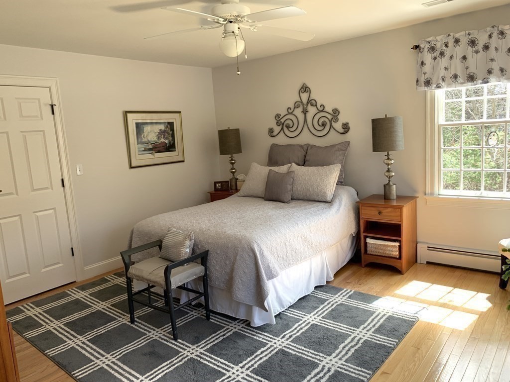 39 Vine Brook Road Medfield, MA 02052 - Photo 32 of 42 a bedroom with a bed and a window