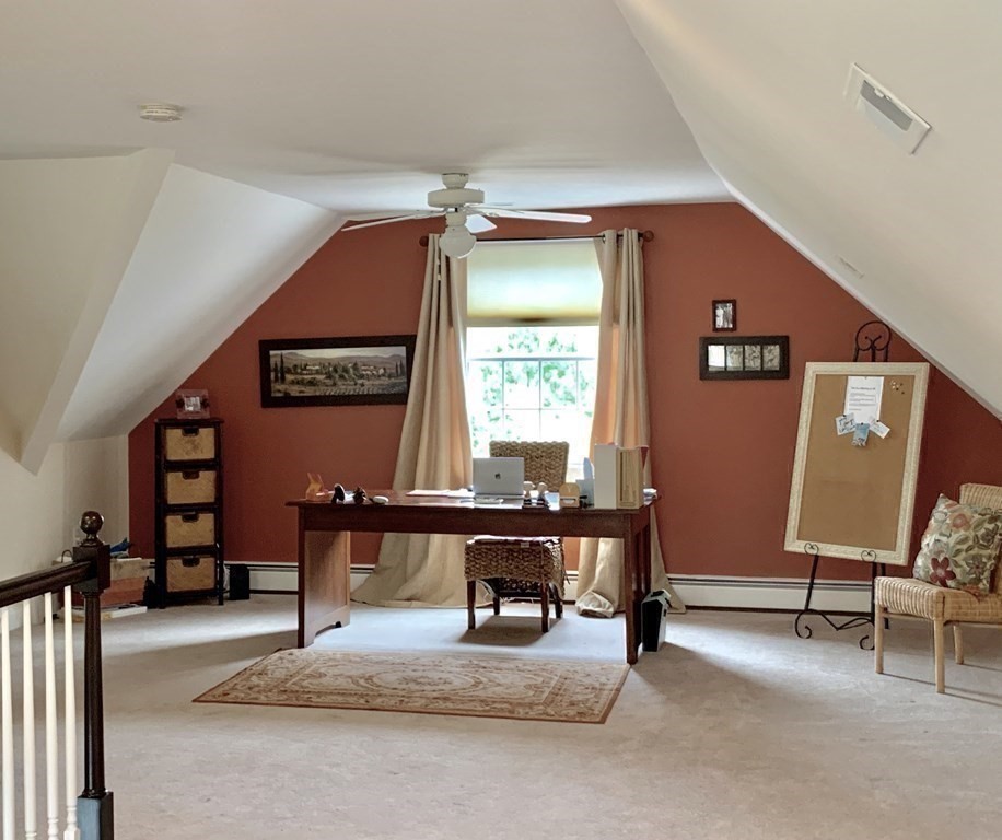 39 Vine Brook Road Medfield, MA 02052 - Photo 35 of 42 a room with furniture and window