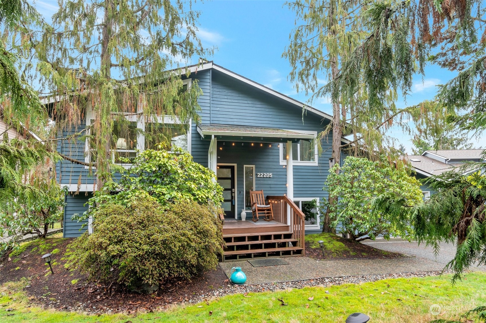 22205 5th Drive Southeast Bothell, WA 98021 - Photo 1 of 15 front view of a house with a garden