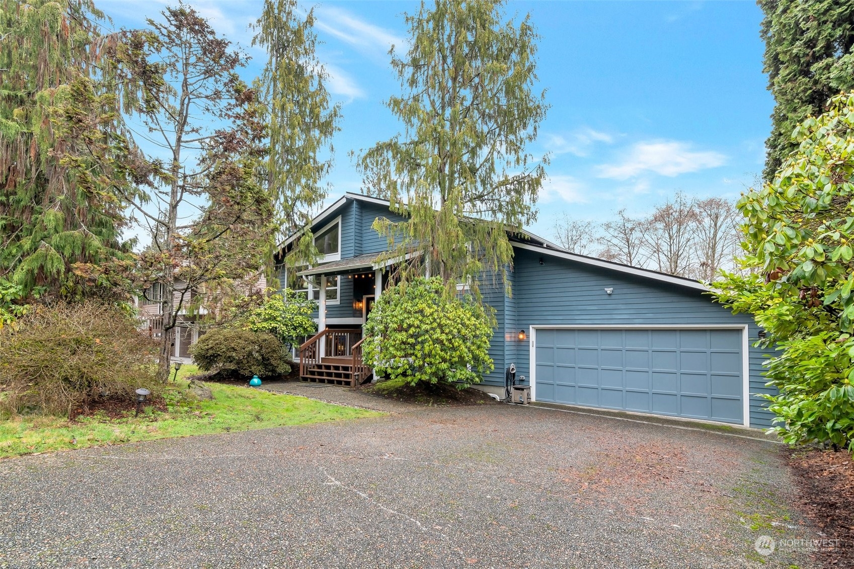 22205 5th Drive Southeast Bothell, WA 98021 - Photo 2 of 15 a front view of a house with garden