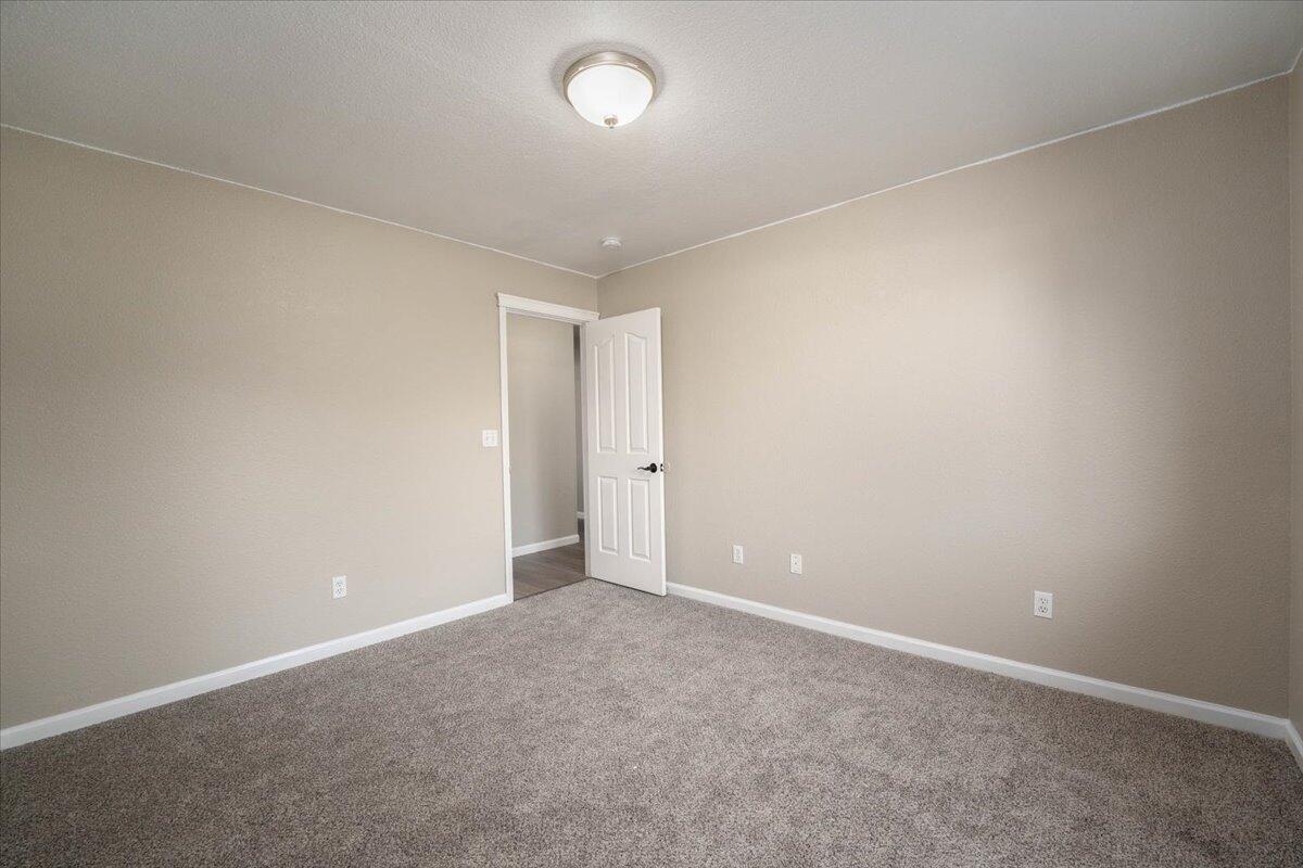 7704 Pit Road Redding, CA 96001 - Photo 20 of 34 an empty room with an entryway