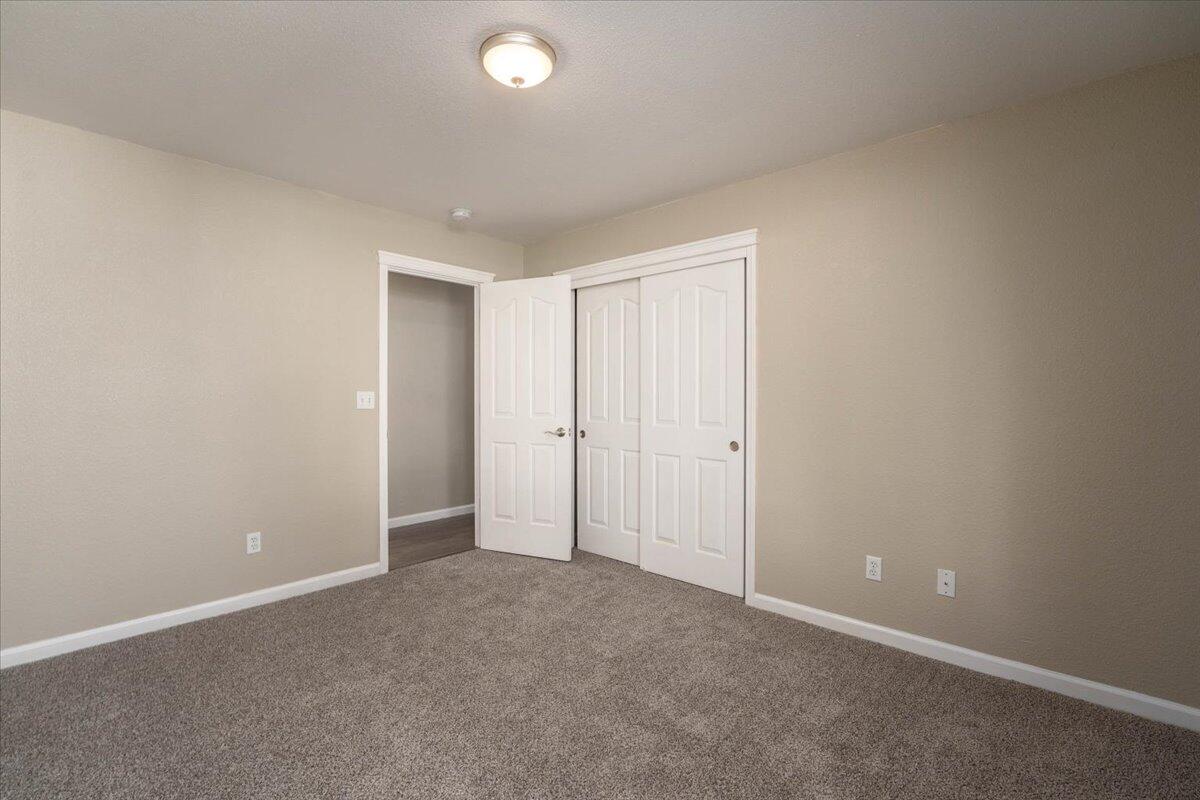 7704 Pit Road Redding, CA 96001 - Photo 22 of 34 an empty room with closet area