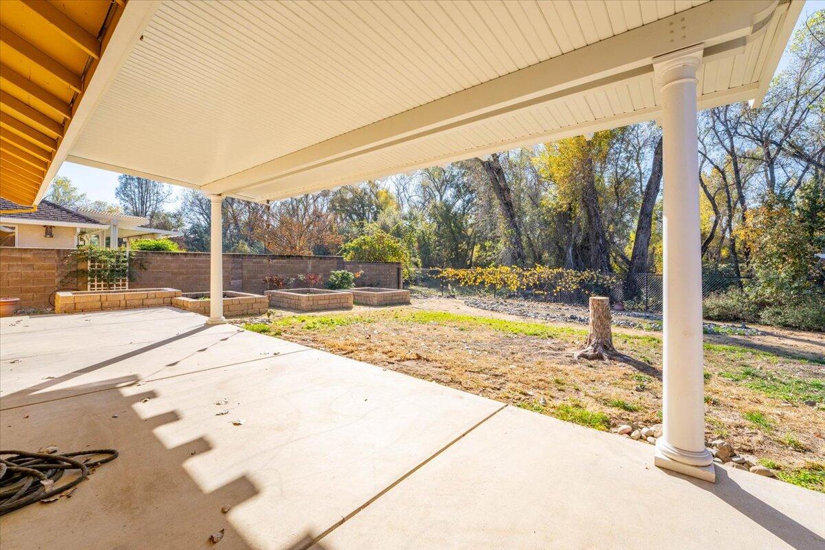 7704 Pit Road Redding, CA 96001 - Photo 26 of 34 a view of swimming pool with a patio