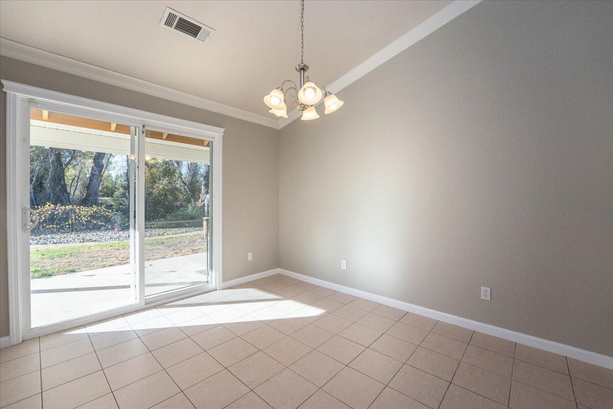 7704 Pit Road Redding, CA 96001 - Photo 10 of 34 a view of a room with window