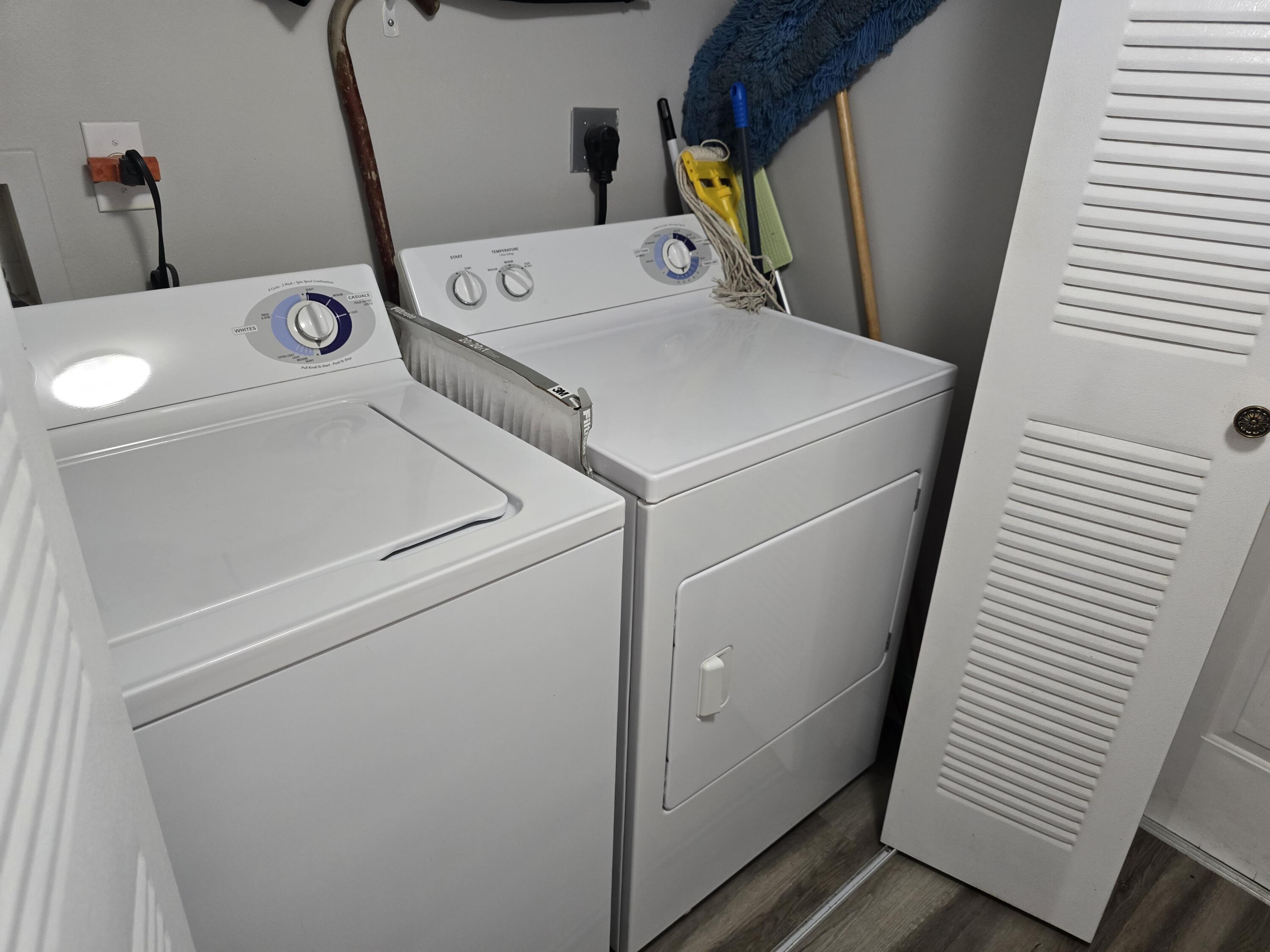701 Villa Circle Boynton Beach, FL 33435 - Photo 12 of 17 a utility room with dryer and washer