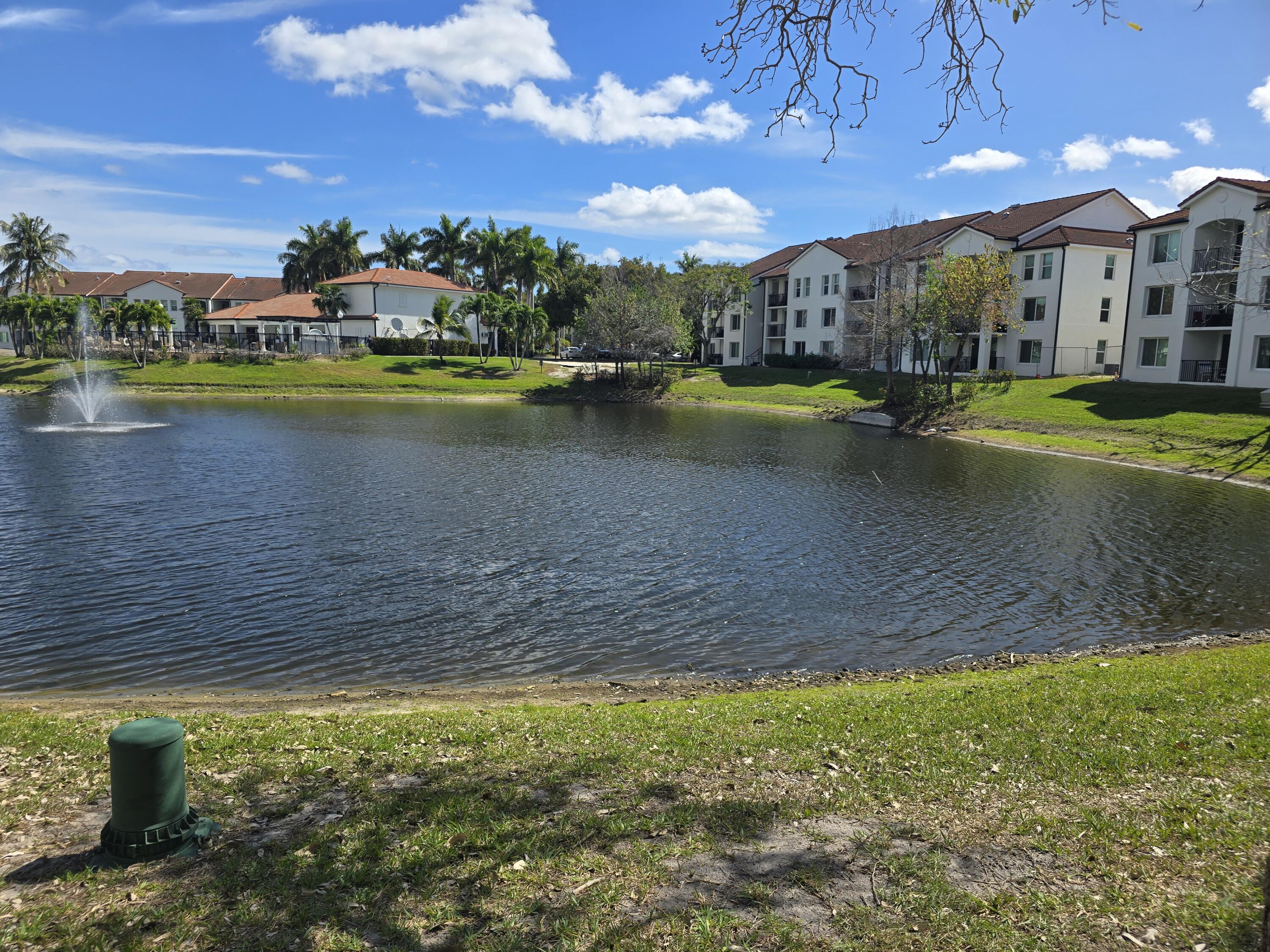 701 Villa Circle Boynton Beach, FL 33435 - Photo 15 of 17 a view of a lake with houses