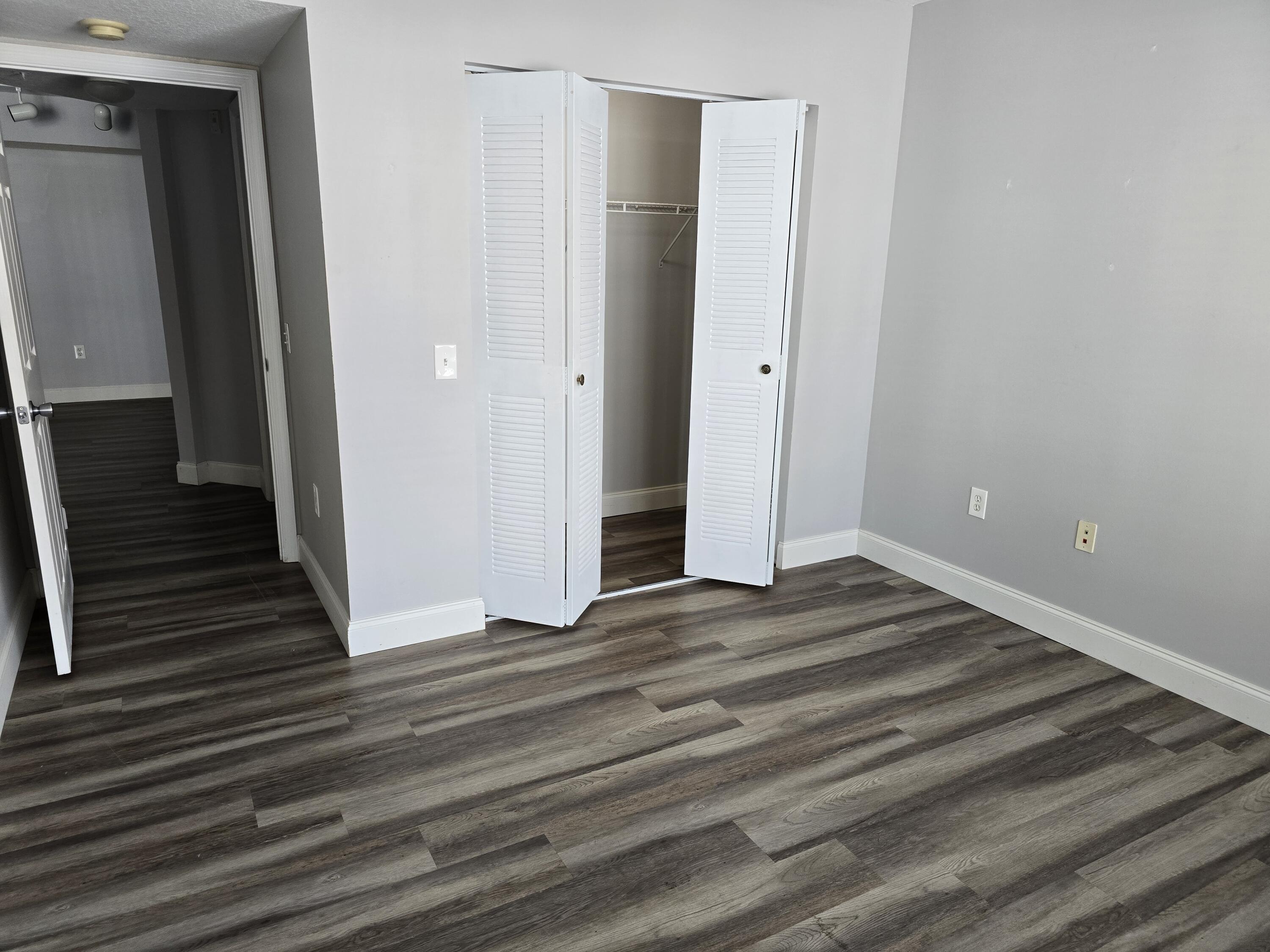 701 Villa Circle Boynton Beach, FL 33435 - Photo 7 of 17 a view of a livingroom from a hallway