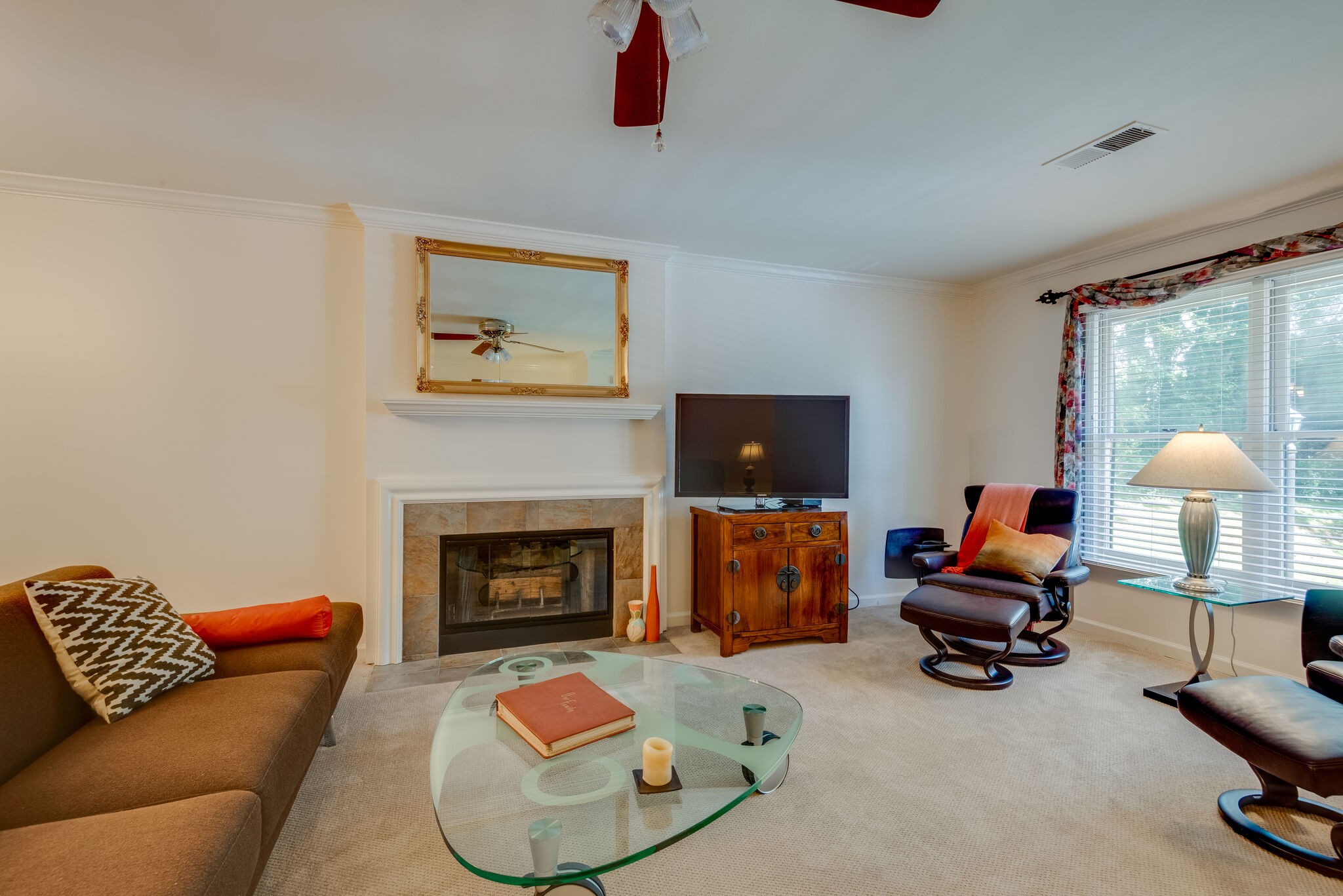 745 Kent Road Nashville, TN 37214 - Photo 3 of 26 a living room with furniture and a fireplace