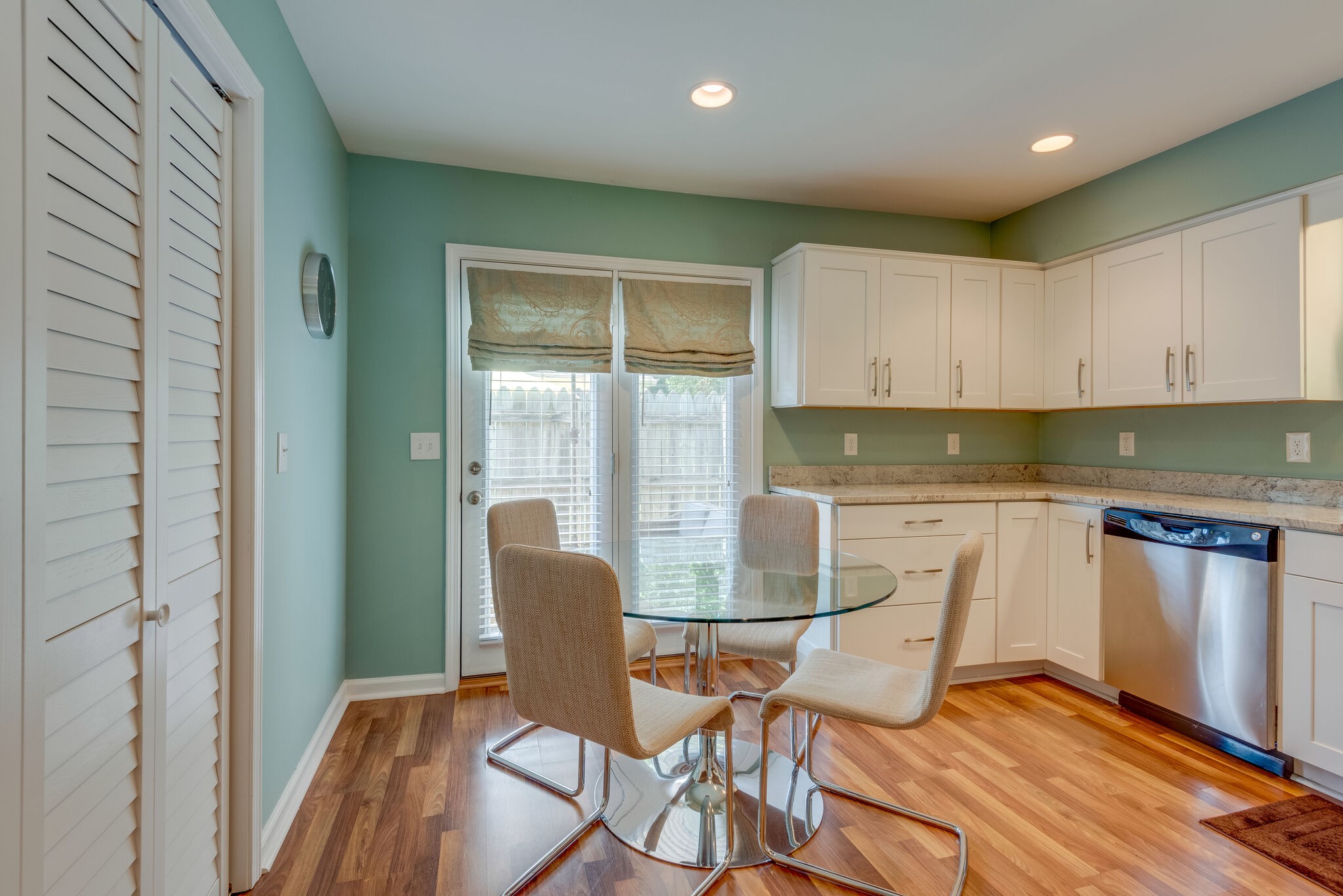 745 Kent Road Nashville, TN 37214 - Photo 8 of 26 a view of a kitchen with dining area a sink and dishwasher
