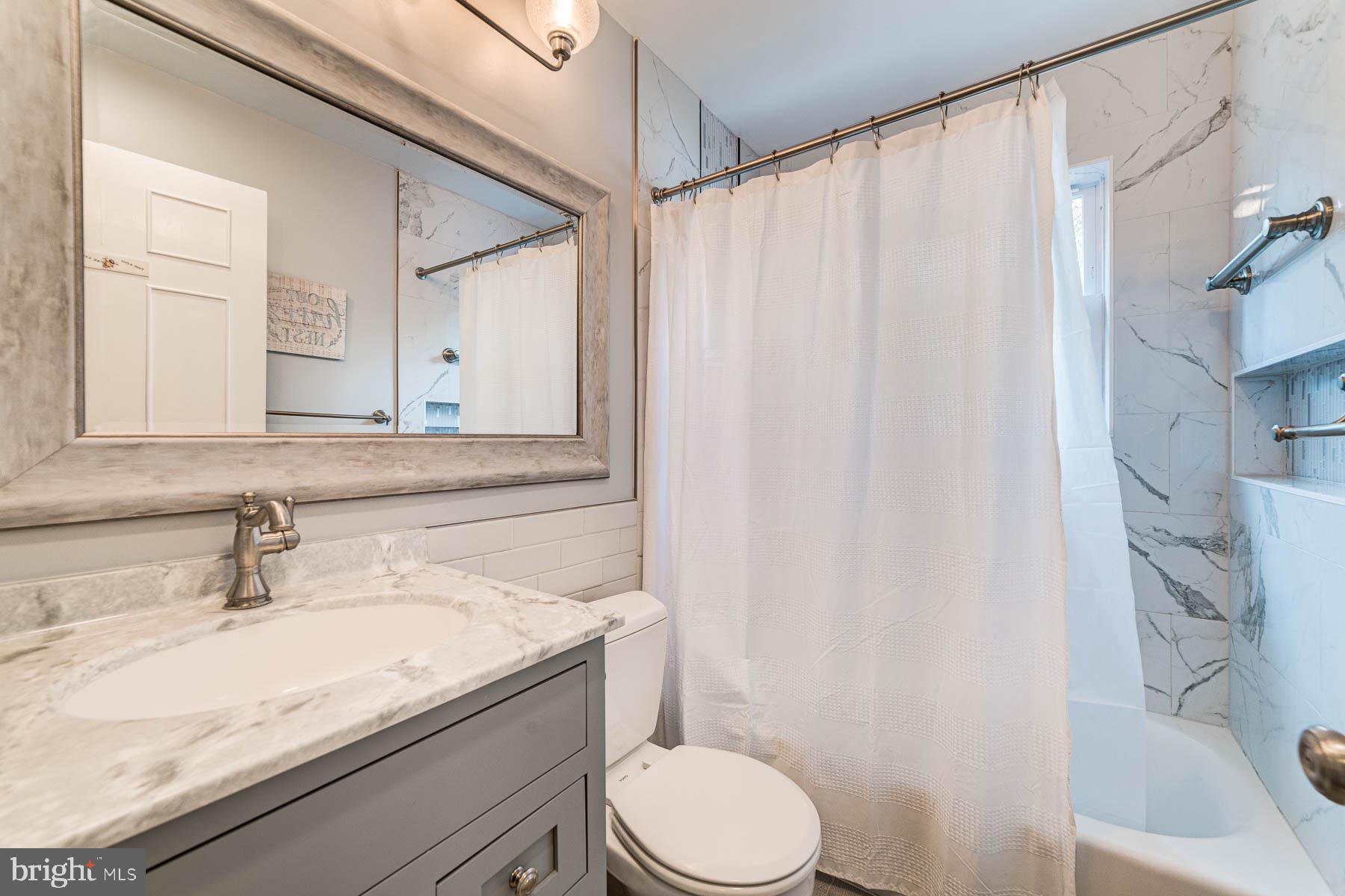 5902 Frederick Street Springfield, VA 22150 - Photo 21 of 46 Updated Main Level Bath with Extra Storage
