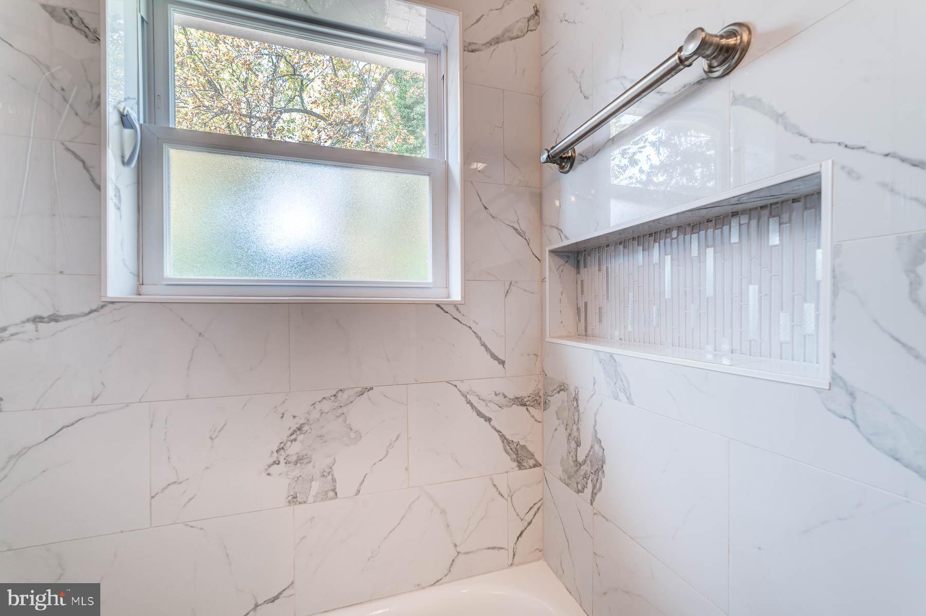5902 Frederick Street Springfield, VA 22150 - Photo 22 of 46 Updated Main Level Bath with Extra Storage