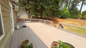 446 Russell Cemetery Road Winder, GA 30680 - Photo 36 of 40 a view of a balcony with wooden floor