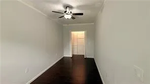 a view of a hallway with a window