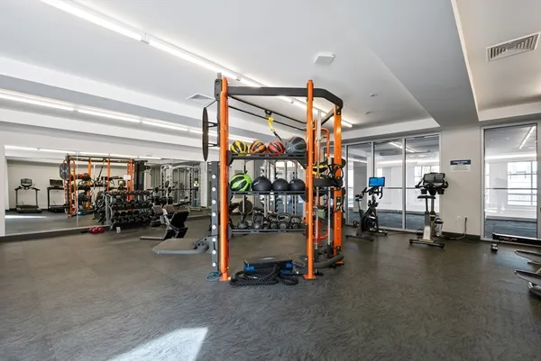 a view of a garage with gym equipment