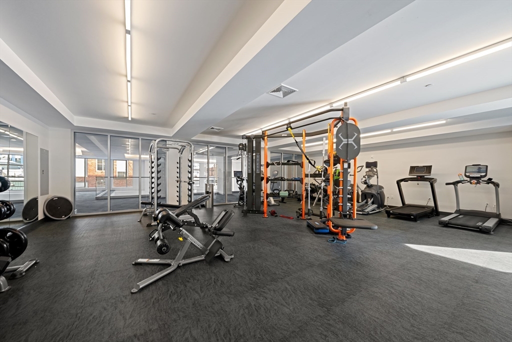 45 West 3rd Street, Unit 406 Boston, MA 02127 - Photo 12 of 14 a view of a room with gym equipment