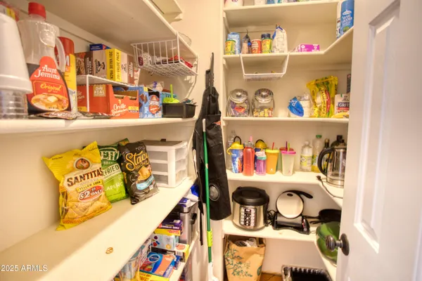 a utility room with storage and utility