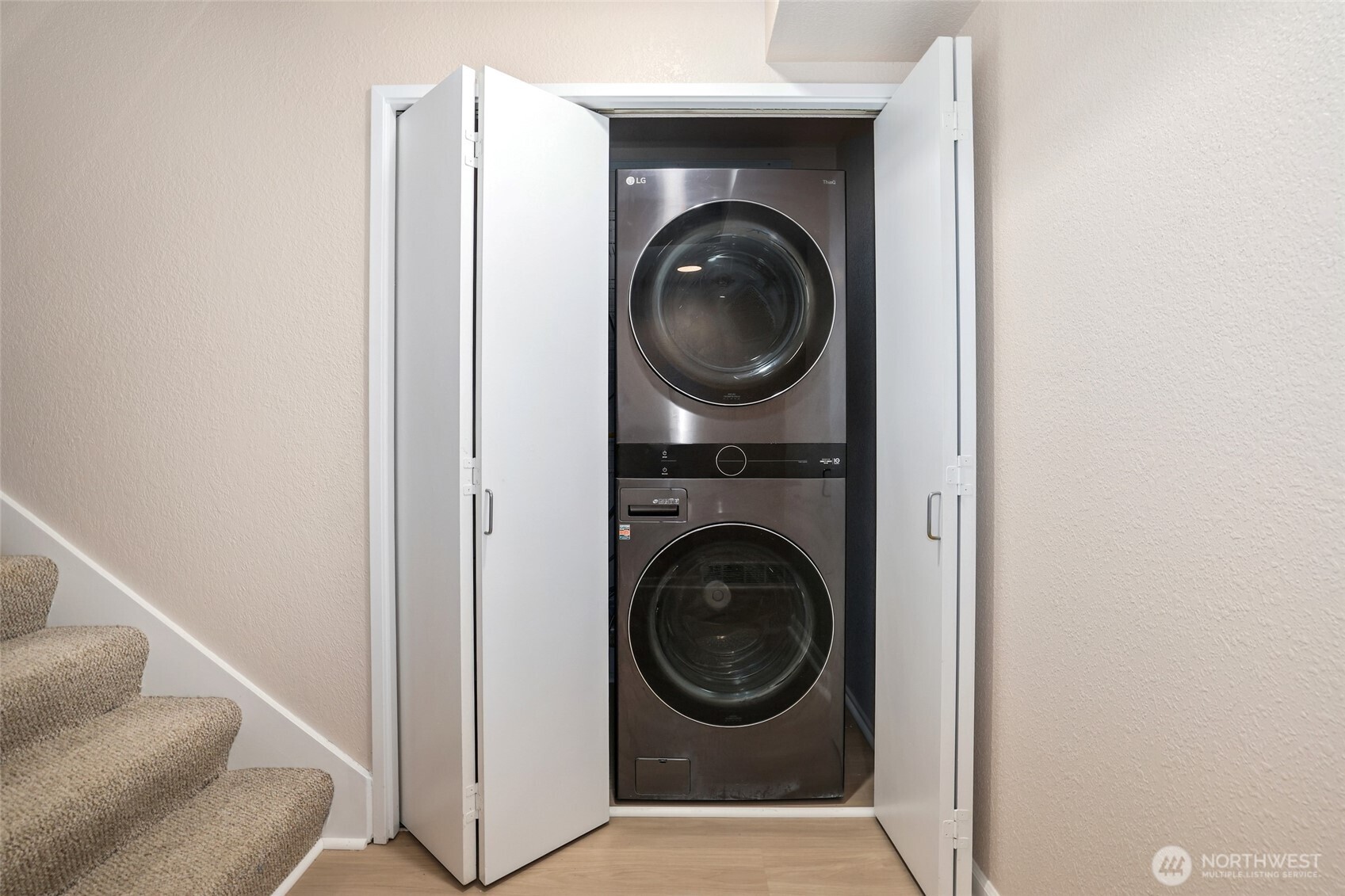 2940 Kennewick Place Northeast Renton, WA 98056 - Photo 13 of 37 a view of a hallway with washer and dryer
