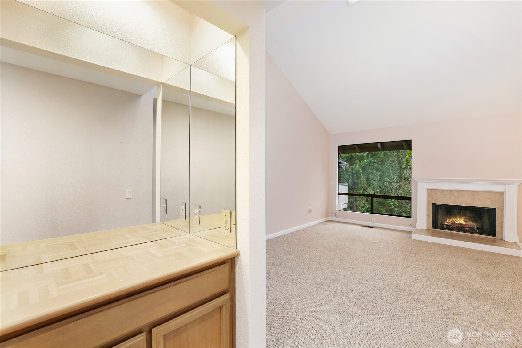 2940 Kennewick Place Northeast Renton, WA 98056 - Photo 3 of 37 a view of an empty room with a window and fireplace