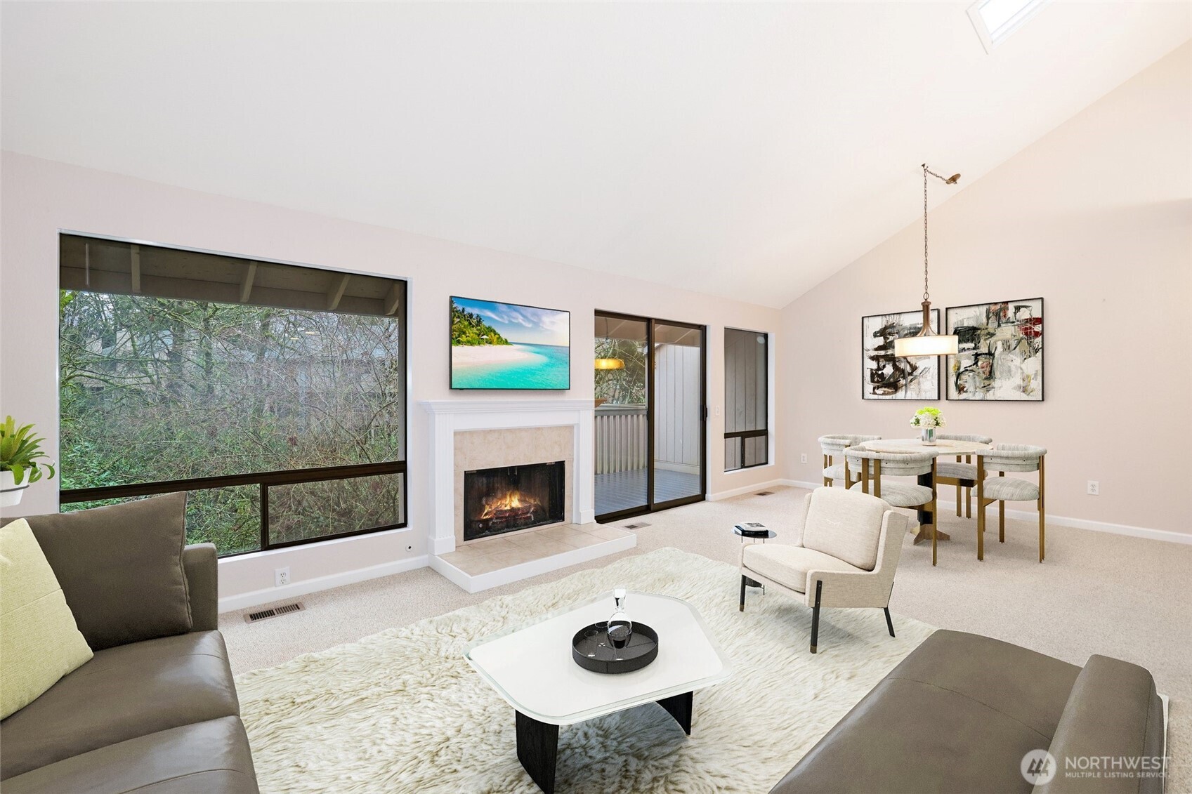 2940 Kennewick Place Northeast Renton, WA 98056 - Photo 4 of 37 a living room with furniture and a fireplace