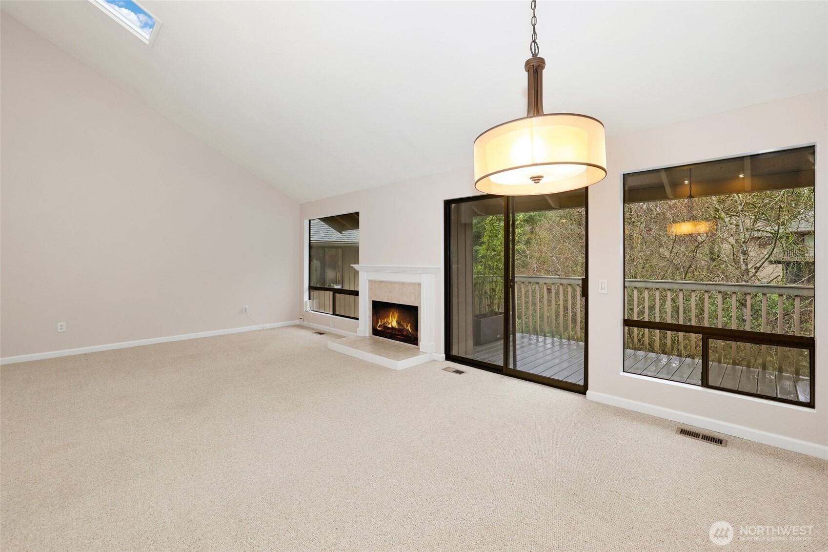 2940 Kennewick Place Northeast Renton, WA 98056 - Photo 5 of 37 a view of an empty room with a sliding door