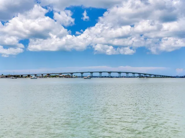 a kitchen with cabinets and window