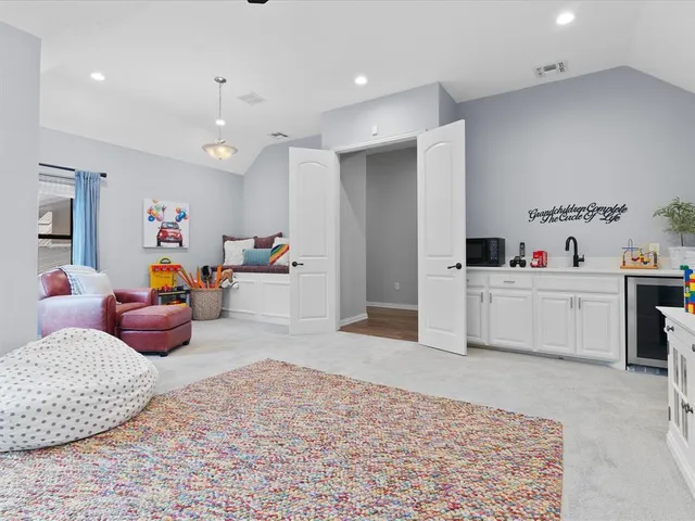 a bedroom with furniture and a bed