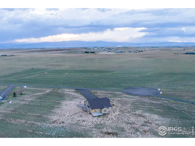 a view of a lake with a big yard
