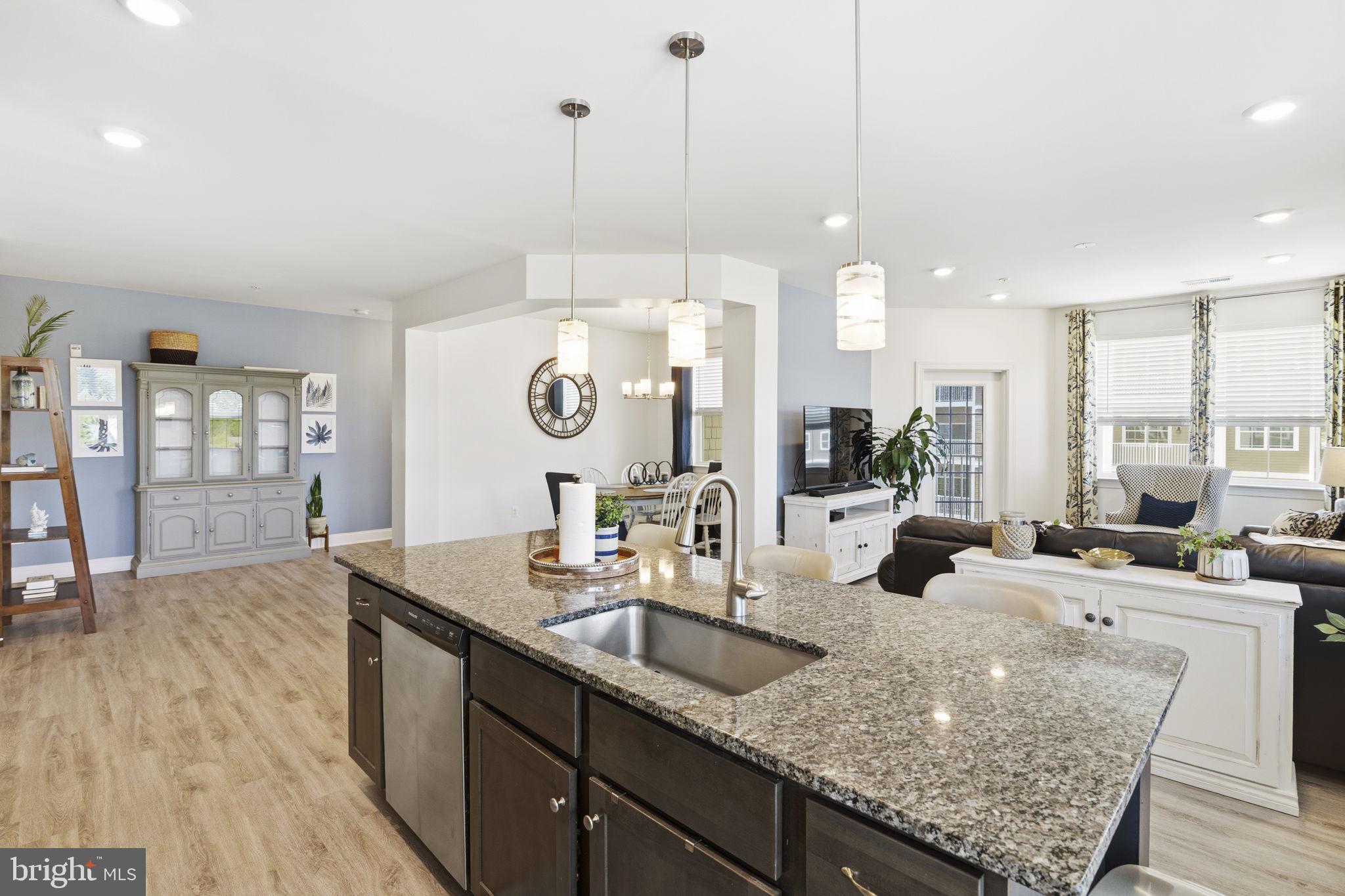 401 Bold Ruler Court, Unit 307 Havre de Grace, MD 21078 - Photo 18 of 32 Kitchen island w/ sink & dishwasher