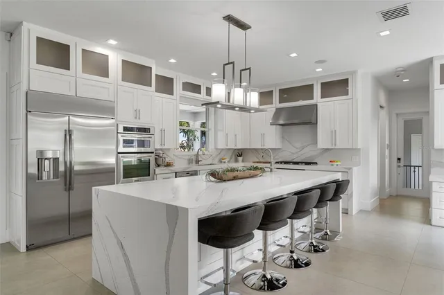 a bathroom with a shower and a sink