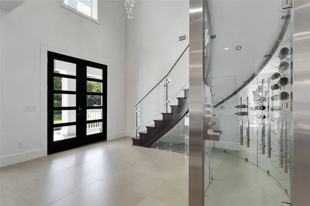 a en suite bathroom with a double vanity sink and a mirror