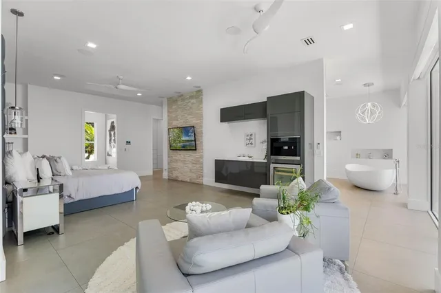 a kitchen with a table and chairs