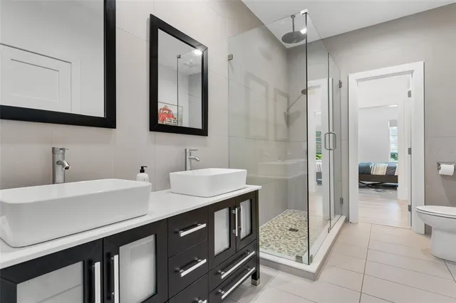 a view of a dining room with furniture wooden floor and chandelier
