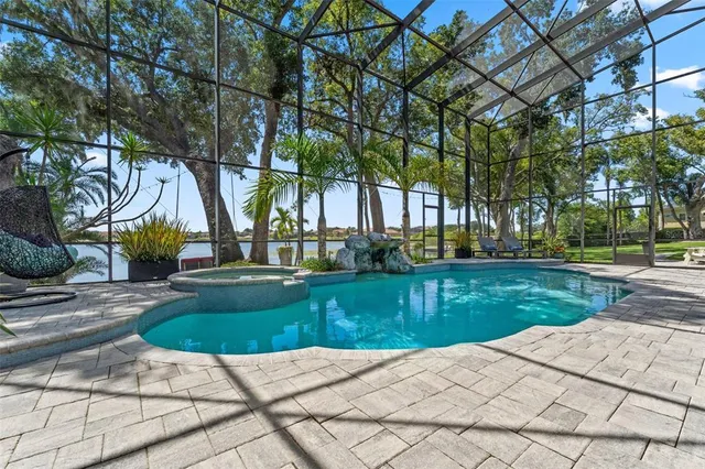 a view of a house with backyard