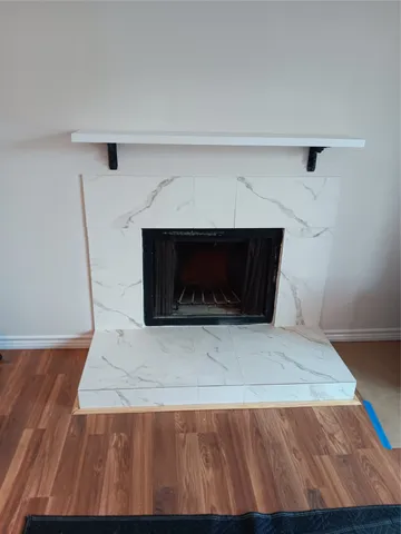 a living room with a fireplace