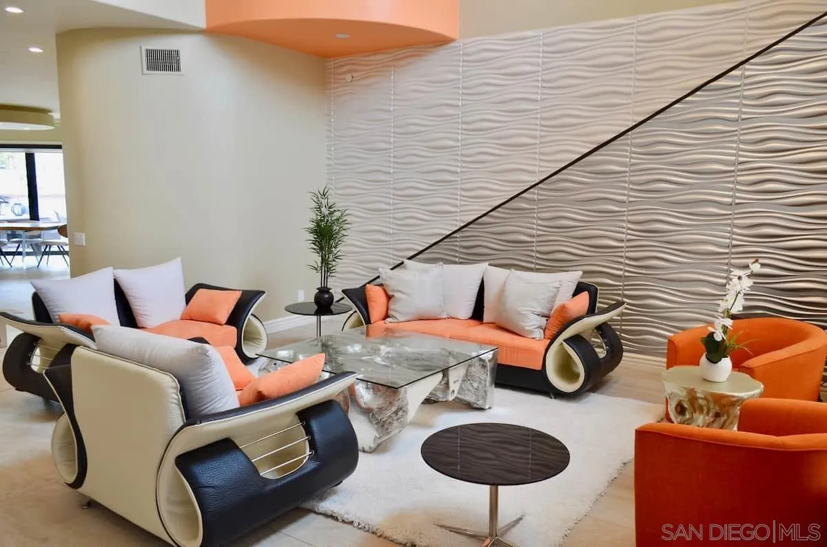 1235 Neptune Avenue Encinitas, CA 92024 - Photo 23 of 32 a living room with furniture and a wooden floor