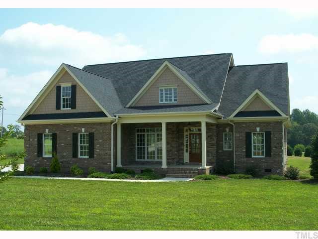 65 North Old Lantern Road Timberlake, NC 27583 - Photo 1 of 12 a front view of a house with a yard