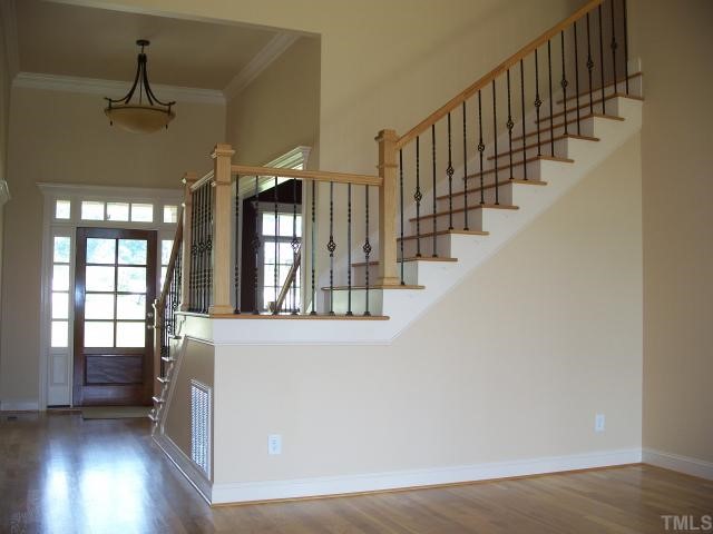 65 North Old Lantern Road Timberlake, NC 27583 - Photo 4 of 12 wooden floor in an entryway with a window