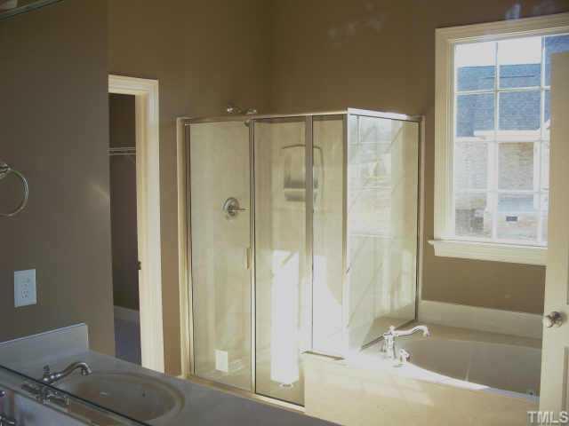 65 North Old Lantern Road Timberlake, NC 27583 - Photo 6 of 12 a bathroom with a tub and a sink