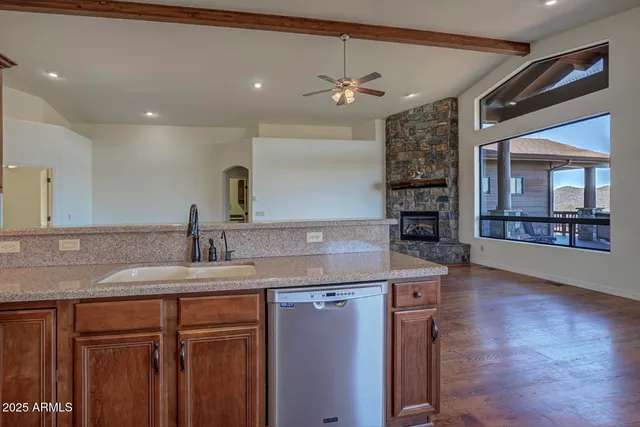 a kitchen with a sink and a refrigerator
