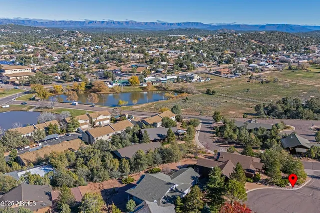 an aerial view of a house with a garden