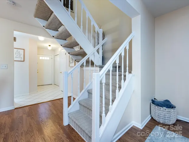 a hallway with wooden floor