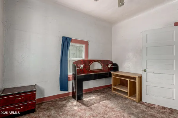 a view of a livingroom with furniture