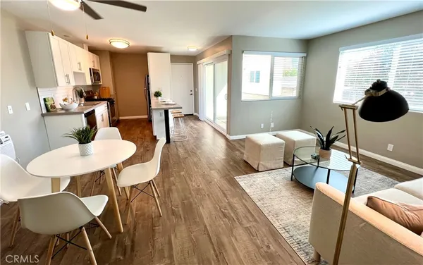 a living room with furniture and a table