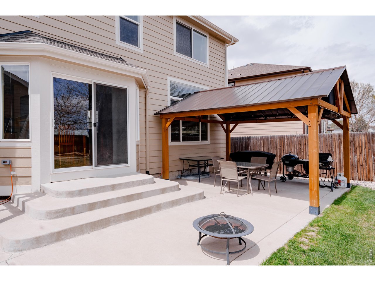 34 Saxony Road Johnstown, CO 80534 - Photo 2 of 49 Pergola allows you to enjoy the outdoors and TV sports, rain or shine!