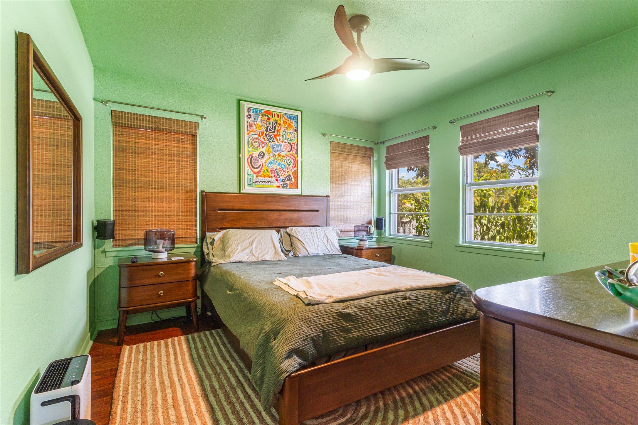 405 West 17th Street Georgetown, TX 78626 - Photo 11 of 21 a bedroom with a bed and windows