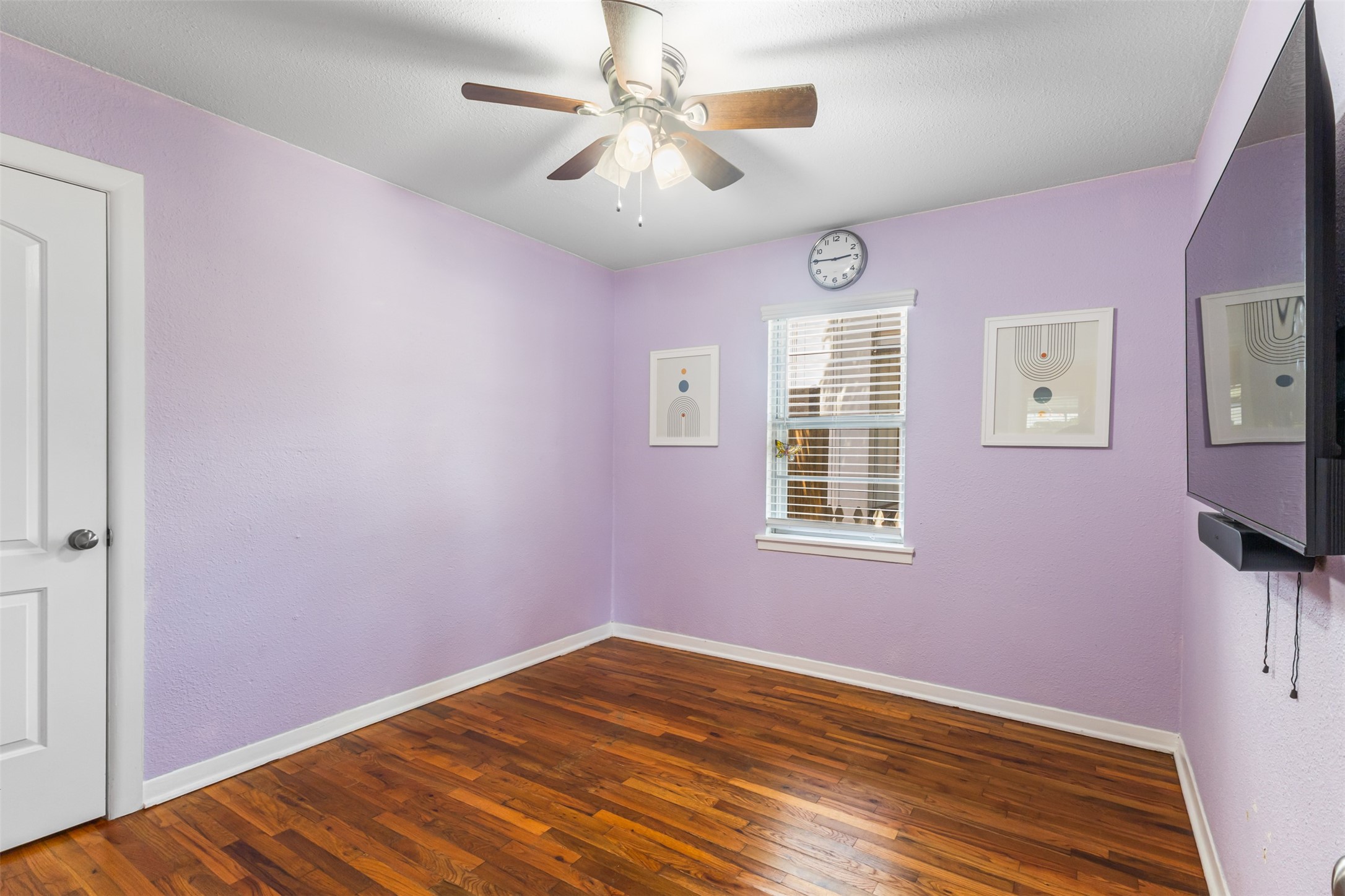 405 West 17th Street Georgetown, TX 78626 - Photo 13 of 21 a view of empty room with wooden floor and fan