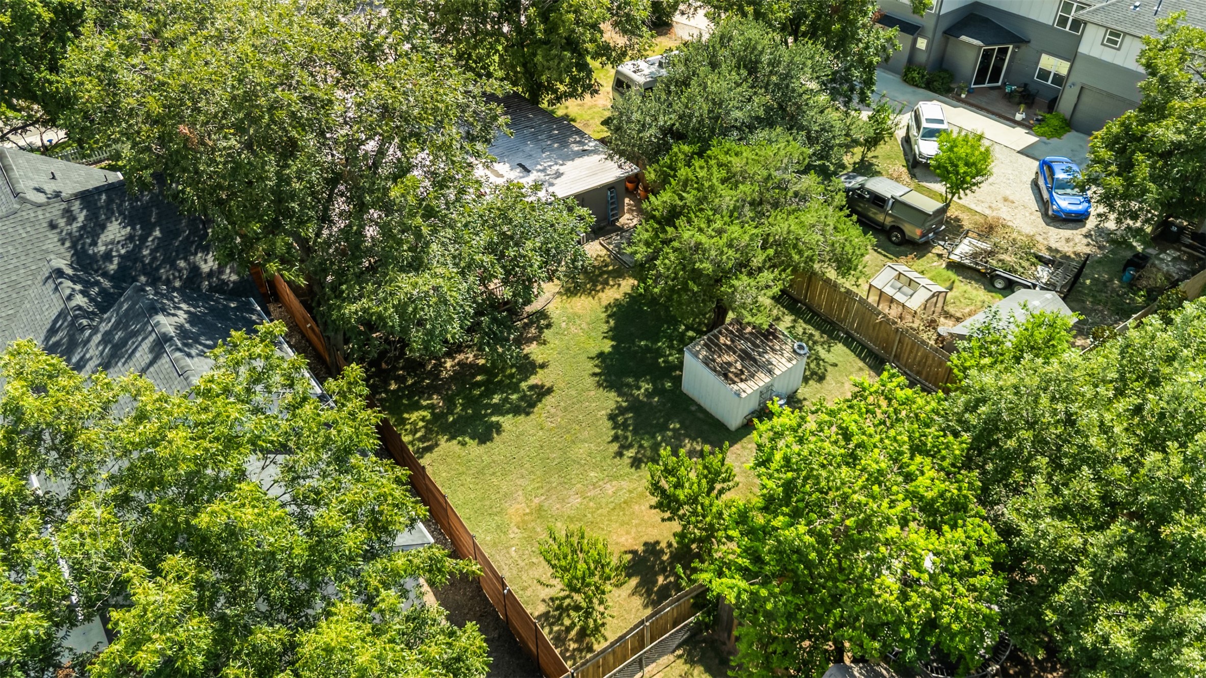 405 West 17th Street Georgetown, TX 78626 - Photo 19 of 21 an aerial view of residential house with outdoor space and trees all around